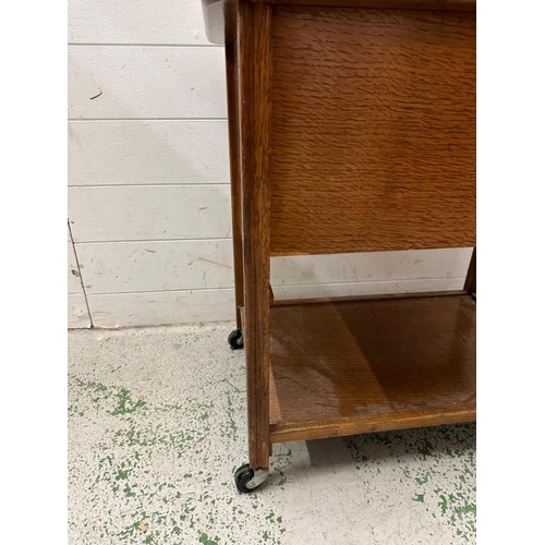 163 - A Mid Century teak work box on castors with shelf under H62cm W62cm D44cm)