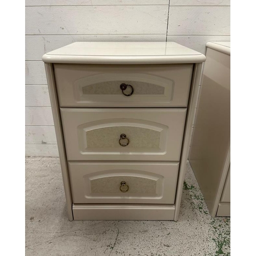 167 - A pair of white contemporary three drawer bedside tables