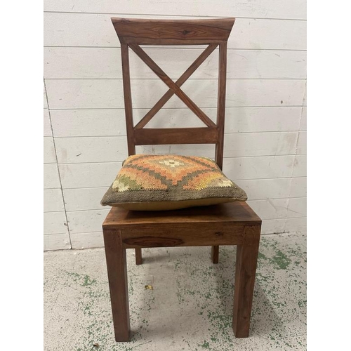 175 - A set of four hardwood cross back dining chairs