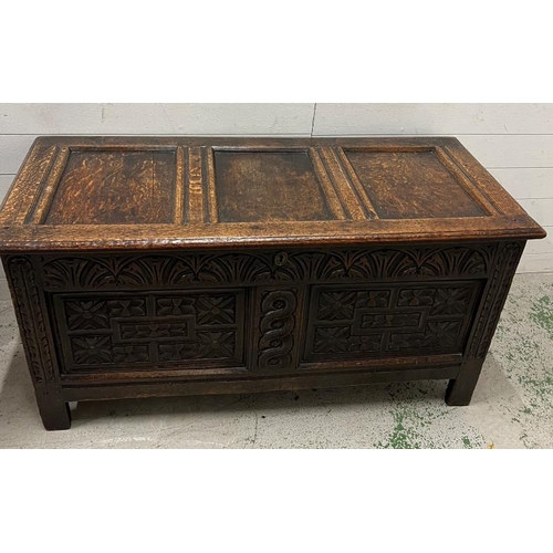 177 - A heavily carved oak coffer with hinged lid opening to storage and internal candle box 127 L x 54 d ... 