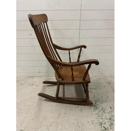 189 - A vintage oak spindle back rocking chair