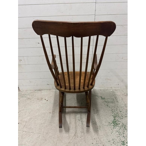 189 - A vintage oak spindle back rocking chair