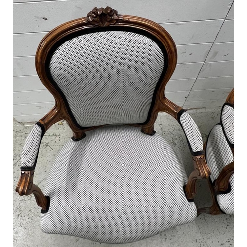 19 - A pair of Louis style open arm chairs