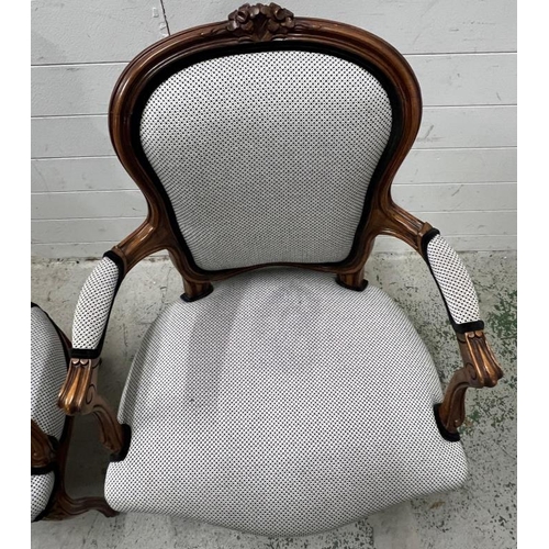 19 - A pair of Louis style open arm chairs