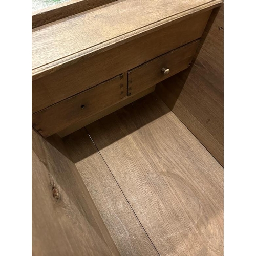 194 - An 19th Century German oak chest with hinged lid opening to storage, two drawers and candle box (H80... 