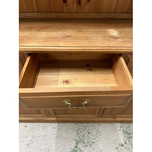 201 - A pine Welsh dresser with astragal glazed doors to top and three drawers and three cupboards under (... 