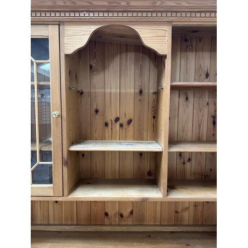 201 - A pine Welsh dresser with astragal glazed doors to top and three drawers and three cupboards under (... 