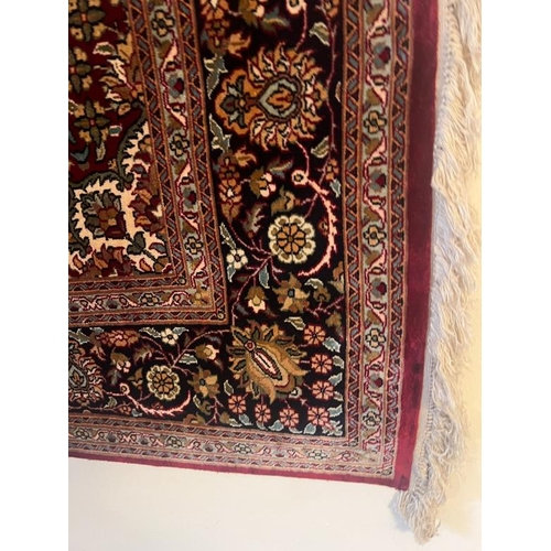 215 - A fine silk Kashmir rug, North India 127cm x 177cm