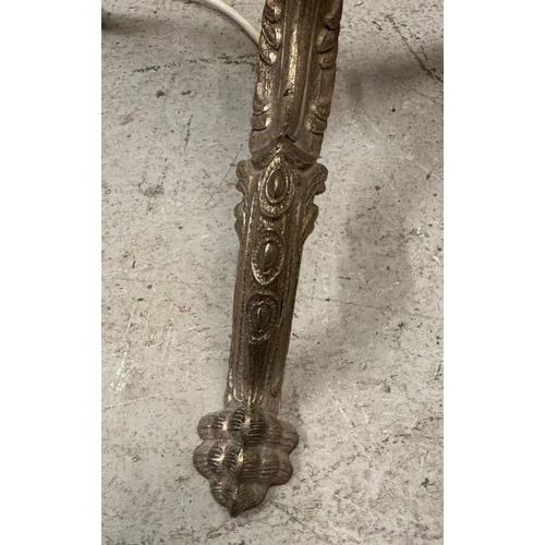 223 - An oak barley twist floor lamp on brass lions paw tripod legs