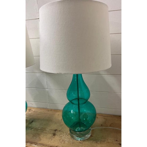 226 - A pair of glass curved table lamp in teal