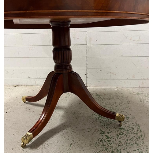 23 - A Regency style mahogany centre table (H73cm Dia112cm)