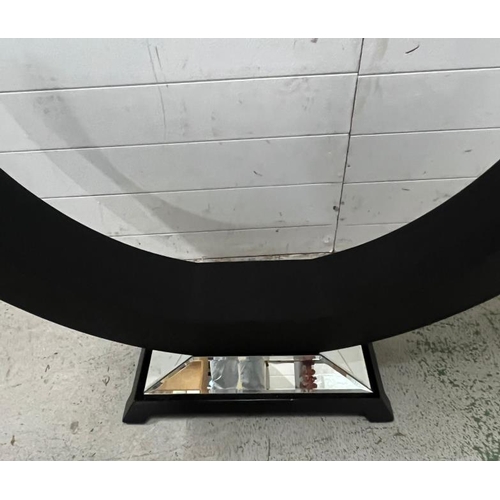 24 - A contemporary mirrored console table