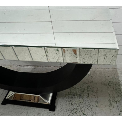 24 - A contemporary mirrored console table