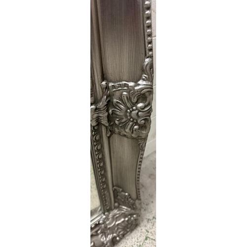 242 - A silver painted hall mirror with floral relief 115cm x 87cm