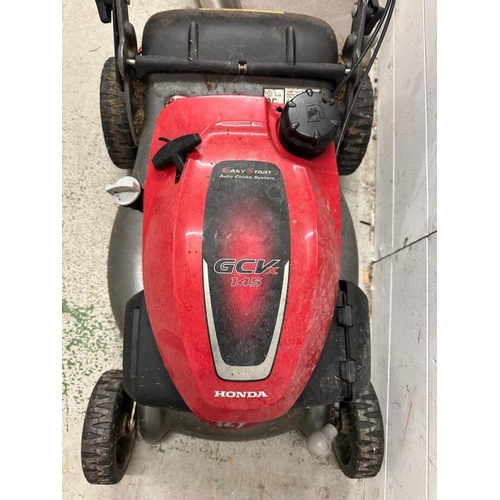 247 - A Honda GCVX petrol lawn mower with grass collector (untested)