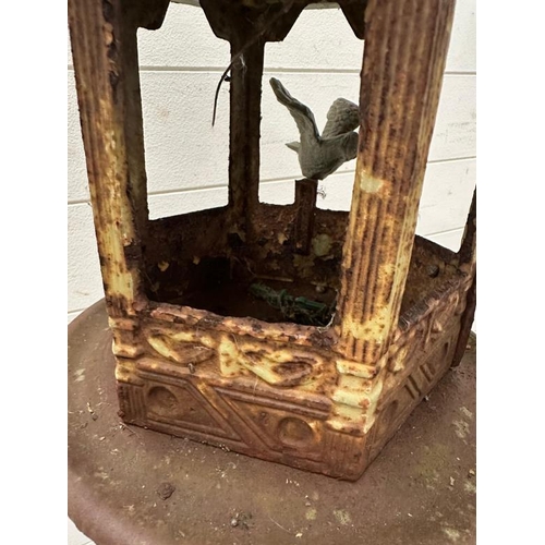 253 - A cast iron green pedestal garden bird feeder on an empire column and circular base H143cm