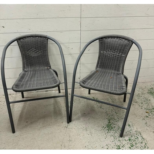 254 - Two grey metal and rattan garden chairs