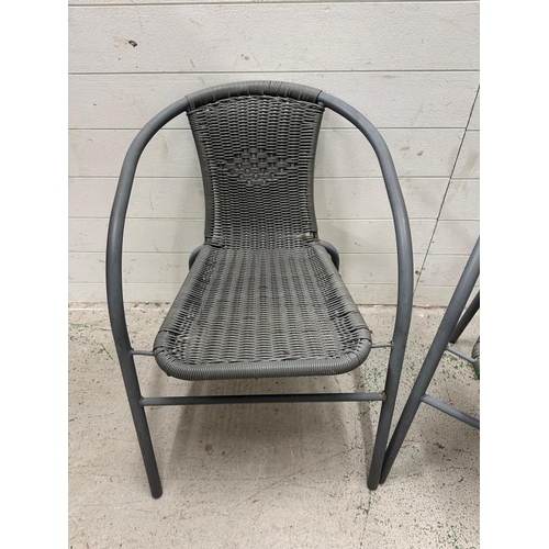 254 - Two grey metal and rattan garden chairs