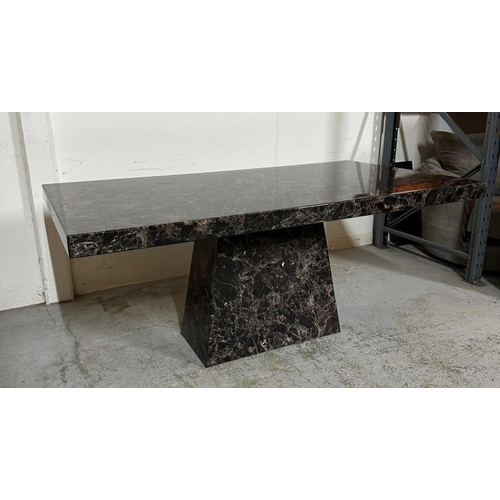 26 - A black marble pedestal dining table (H77cm W180cm D100cm)