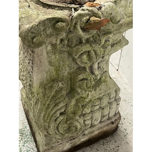 264 - A garden statue of a maiden on a raised plinth holding water jugs, reconstituted stone H126cm, plint... 