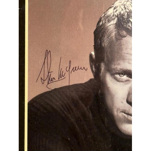 277 - A framed signed photograph of Steve McQueen