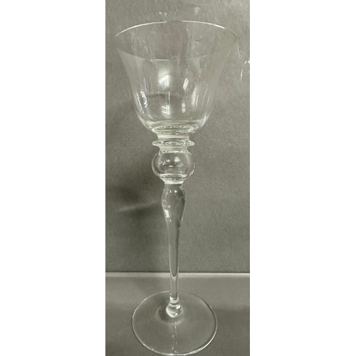 284 - A set of six Murano glass champagne flutes together with six red and six white wine glasses with acc... 