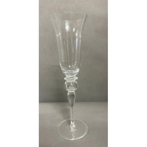 284 - A set of six Murano glass champagne flutes together with six red and six white wine glasses with acc... 