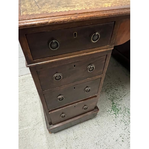 3 - A mahogany pedestal desk with leather top (H74cm W133cm D70cm)