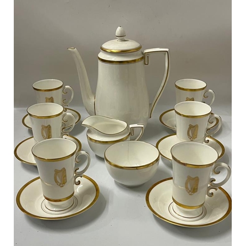 302 - A Royal Worcester, six place setting coffee service with Irish harp design.