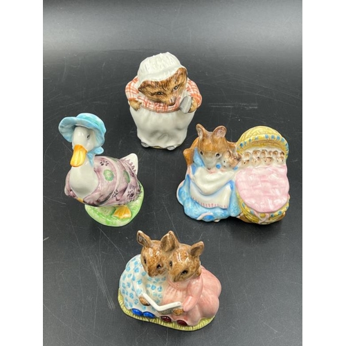 326 - A selection of four Beatrix Potter themed china figures: Bunnykins by Royal Doulton, Mrs Tiggy Winkl... 