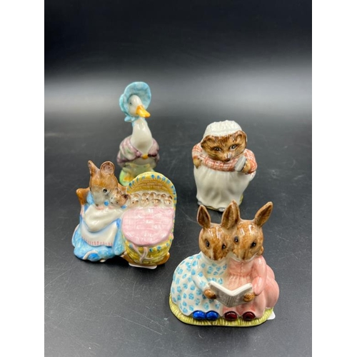 326 - A selection of four Beatrix Potter themed china figures: Bunnykins by Royal Doulton, Mrs Tiggy Winkl... 