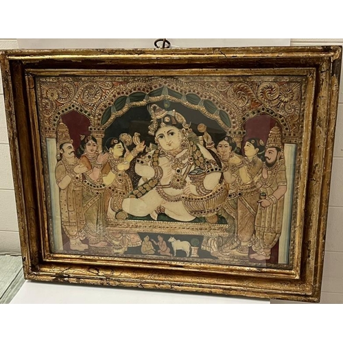 342 - An Indian painted and relief panel depicting Krishna surrounded by attendants under an ornate canopy