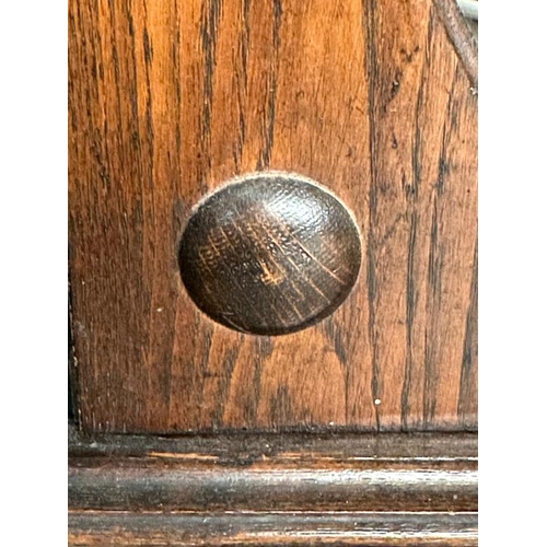 385 - A Victorian carved oak smokers cabinet, bevel glazed and complete with ceramic tobacco jar and clay ... 