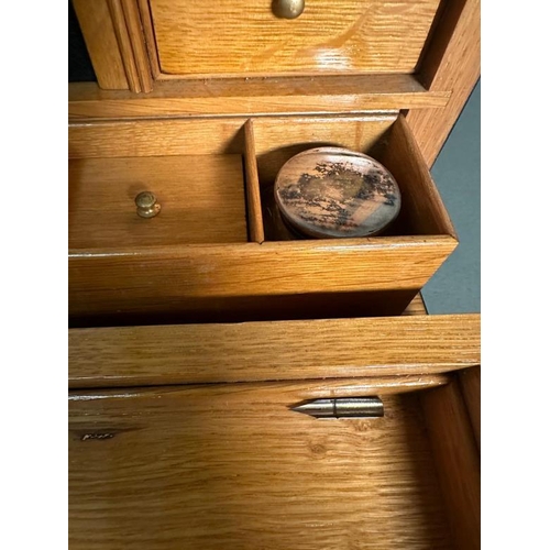 4 - An Edwardian Coromandel stationary box, the fall front opening to a fitted interior comprising of a ... 