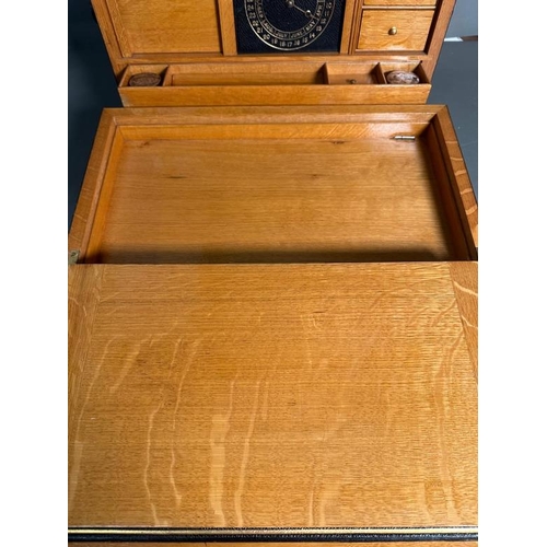 4 - An Edwardian Coromandel stationary box, the fall front opening to a fitted interior comprising of a ... 