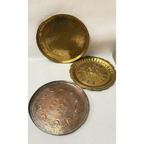 423 - Three Indian copper and brass trays