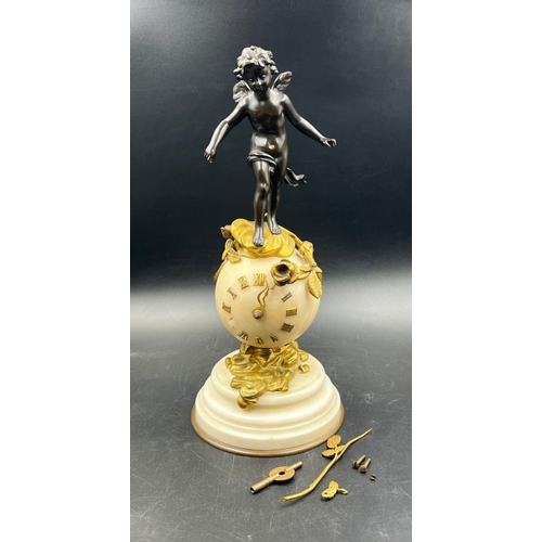 426 - A French white marble sphere clock on marble base with a bronze figure signed Kingsburger (AF)