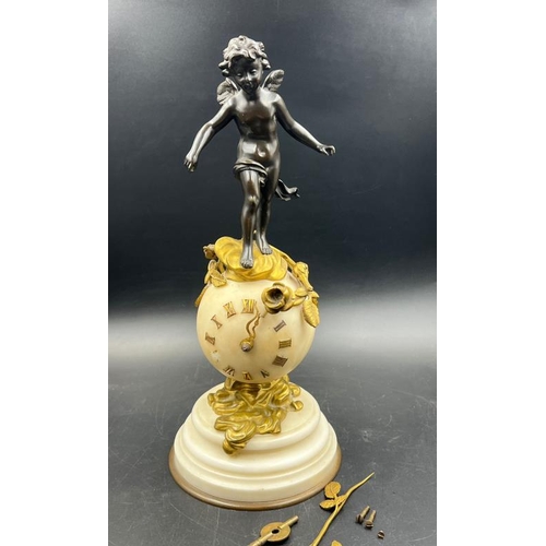 426 - A French white marble sphere clock on marble base with a bronze figure signed Kingsburger (AF)