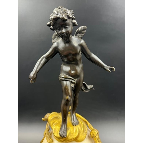 426 - A French white marble sphere clock on marble base with a bronze figure signed Kingsburger (AF)