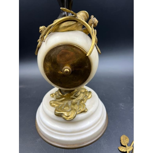 426 - A French white marble sphere clock on marble base with a bronze figure signed Kingsburger (AF)