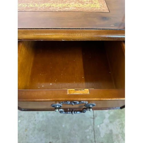 43 - A brown leather topped pedestal desk, central long drawer flanked by four shorter (H76cm W120cm D60c... 