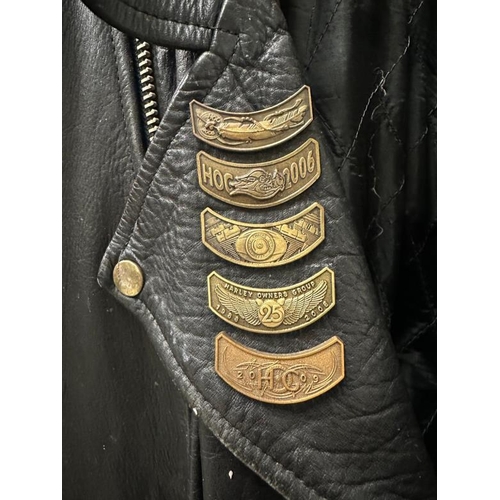 438 - A vintage Shell leather bikers jacket with Harley Davidson owners club badges, size 46