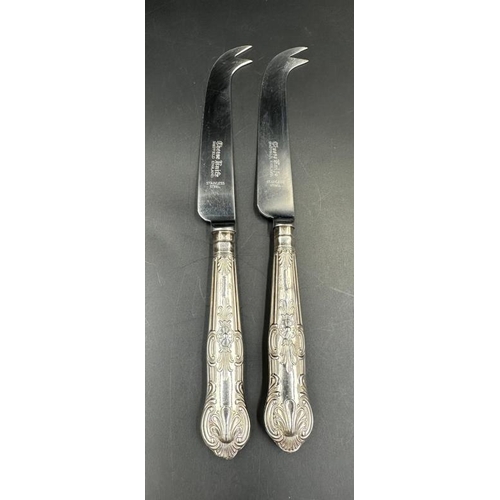 470 - A pair of silver handled cheese knives