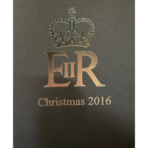 476 - A silver plated easel backed photograph frame, a Christmas present 2016 from Queen Elizabeth II give... 