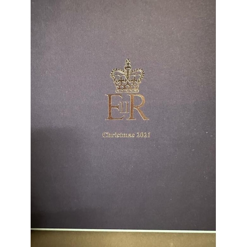 477 - A silver plated photograph frame (wrapped), a Christmas present 2021 from Queen Elizabeth II given a... 