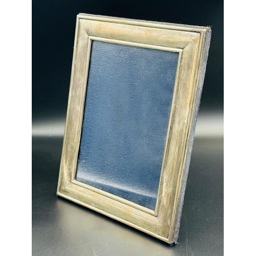 490 - A hallmarked silver easel backed photograph frame, approximate 18cm x 22cm