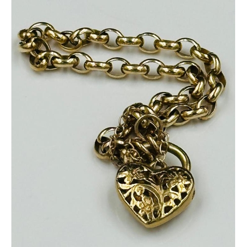 499 - A 9ct gold bracelet with a pierced heart shaped fastener and an approximate weight of 8.2g