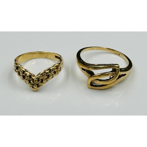 507 - Two 9ct gold rings, a crossover and wishbone style, approximate weight 4.3g