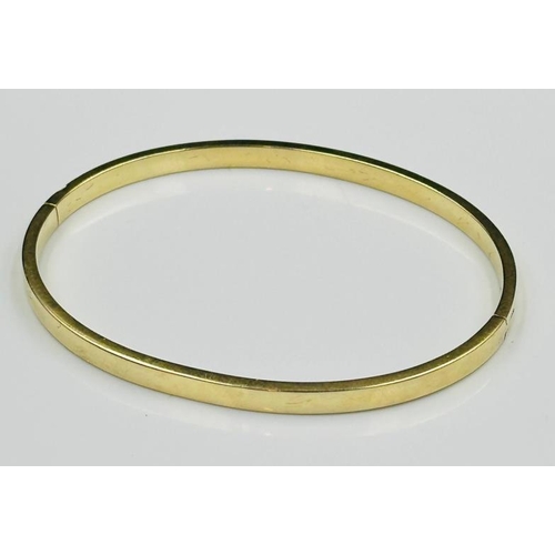 521 - A 14ct gold bangle (585) approximate weight 7.5g