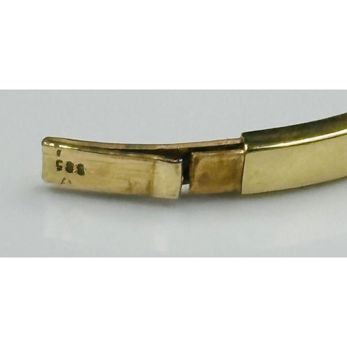 521 - A 14ct gold bangle (585) approximate weight 7.5g